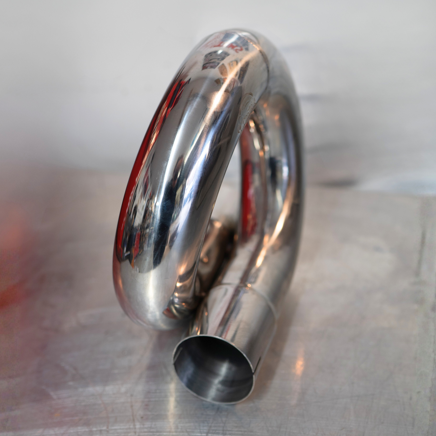 "SPEEDY SWIRL" - Polished Stainless Steel Exhaust Equalizer Loop